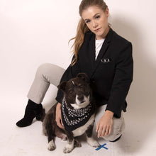 Load image into Gallery viewer, Make a statement with ärtskül's Baby Pop Pocket Square. The design delights and surprises as the contemporary reinterpretation of the distinctive houndstooth black and white motif adds a nice touch of attitude to any suit. Chunks, our ärtskül dog, is pictured wearing the Baby Pop Nana Scarf in Silk Twill.