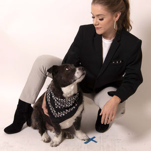 A gift for him that you can wear too! ärtskül's Baby Pop Pocket Square can be repurposed from his suit jacket pocket to yours.  ärtskül’s remixed houndstooth pattern captivates the eye while paying homage to the classic print with a twist of the unexpected.  Chunks, our ärtskül dog, is pictured wearing the Baby Pop Nana Scarf in Silk Twill.