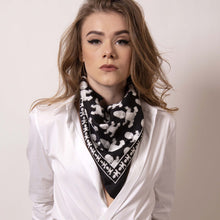 Load image into Gallery viewer, Shift your image from frivolous fashionista to polished professional with a creative edge. ärtskül&#39;s Baby Pop Medium Scarf is a statement piece and adds a signature look to a crisp white fitted shirt. When you&#39;re off the clock, easily create a new draping effect for the evening. 