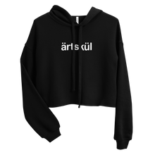 Load image into Gallery viewer, Artskul&#39;s cropped hoodie is as comfortable as it is stylish. This hoodie has a drop shoulder cut and features a trendy raw hem and matching drawstring. The soft and cozy hoodie is likely to become your favorite go-to piece whether on the street, out for a hike, or lounging on the couch. Black hoodie with white artskul logo.
