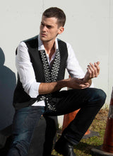 Load image into Gallery viewer, The Baby Pop Ribbon Scarf looks cool with his vest. With a simple drape, it adds an effortless touch of edgy chic to any style. Plus its reversible with simple black on the reverse side. Buy it for him, and you can wear it too.