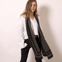 Load image into Gallery viewer, Luxuriously soft, ärtskül’s Baby Pop, Nana Rectangle scarf is the must have classic black and white printed cashmere blend scarf. The scarf drapes beautifully to create a playful and polished statement that’s effortlessly cool and can carry you through any occasion. Lightweight and warming, its perfect for today’s wardrobe that works around the clock.