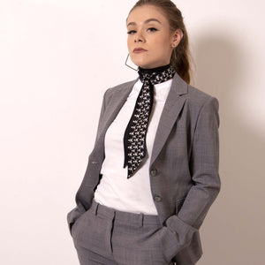 Style ärtskül's edgy Baby Pop Ribbon Scarf as a neck tie with your favorite boss babe suit.  ärtskül scarves are statement pieces, adding edgy sophistication to any style that it’s paired with - from streetwear to the office and into the evening. Live Artfully.