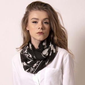  As smooth and soft to the touch as this fabric is, you'll love the way it feels against your neck. Light weight yet warm, Artskul's Baby Pop Large Square Cashmere Blend Scarf can be rolled and tied to create an infinity loop. This unique scarf is printed by master Italian craftsman and made from the most luxurious fabric with hand fringed edging.