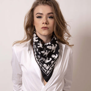 Shift your image from frivolous fashionista to polished professional with a creative edge. ärtskül's Baby Pop Medium Scarf is a statement piece and adds a signature look to a crisp white fitted shirt. When you're off the clock, easily create a new draping effect for the evening. 