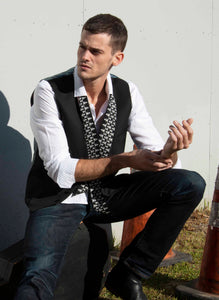 The Baby Pop Ribbon Scarf looks cool with his vest. With a simple drape, it adds an effortless touch of edgy chic to any style. Plus its reversible with simple black on the reverse side. Buy it for him, and you can wear it too.